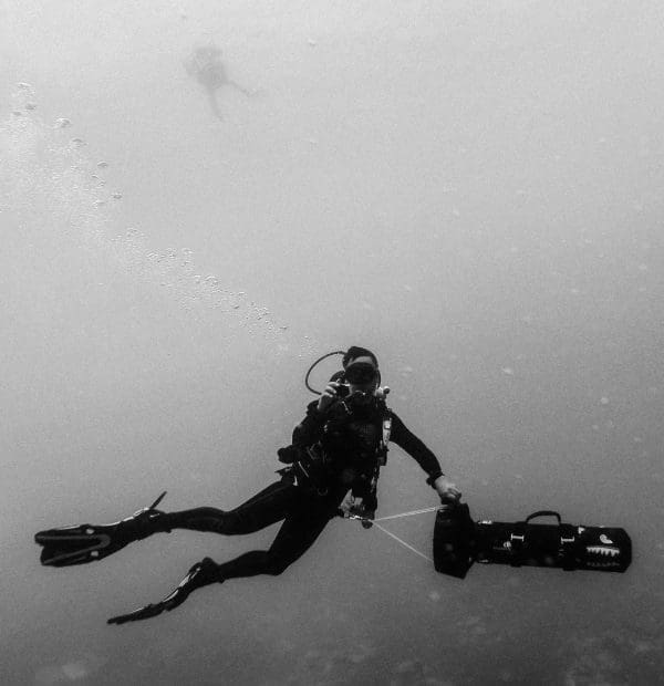 Beginner tech diver prepping liveaboard diving gear.