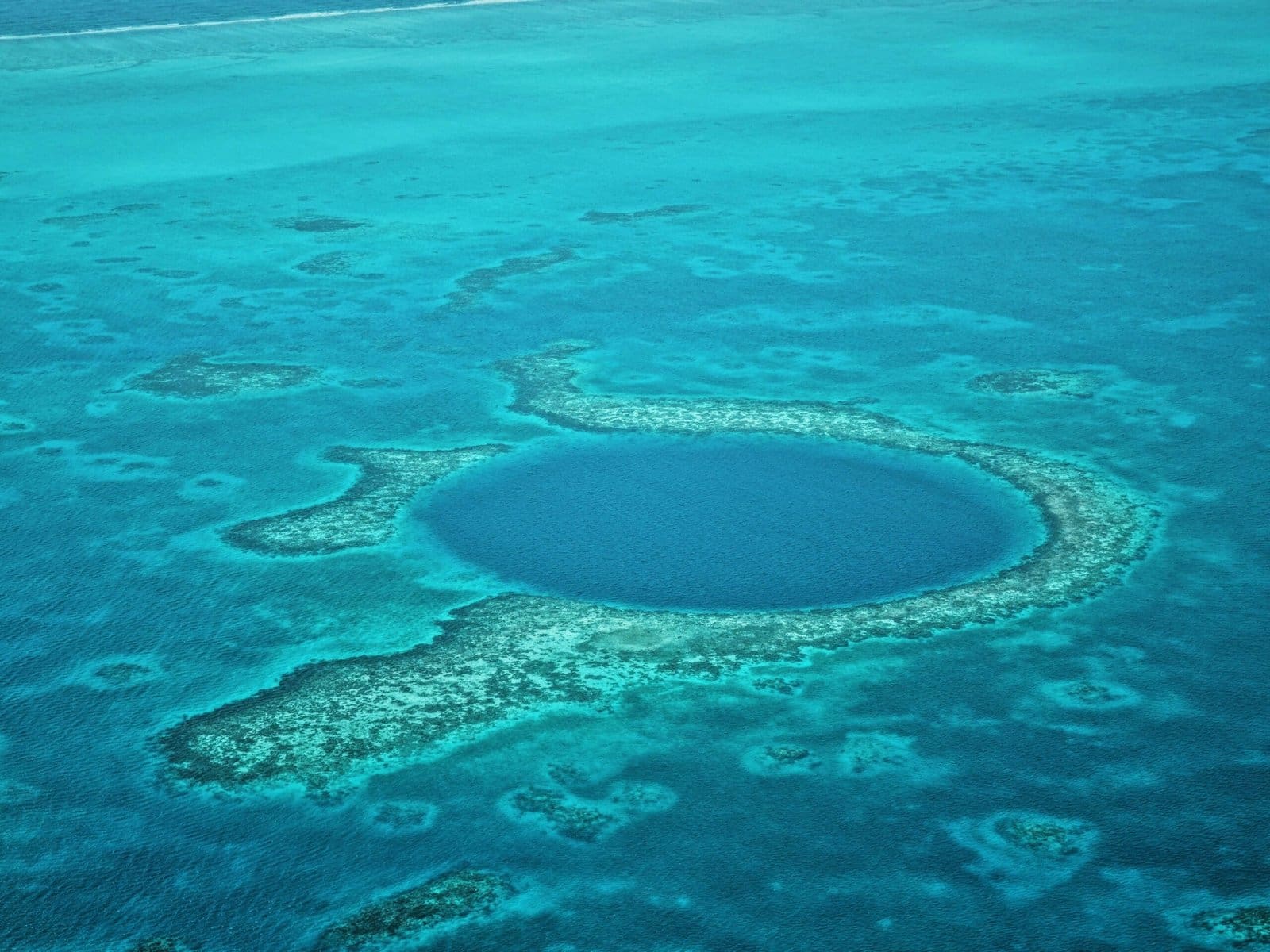 Aerial view of Great Blue Hole, Belize coral reefs