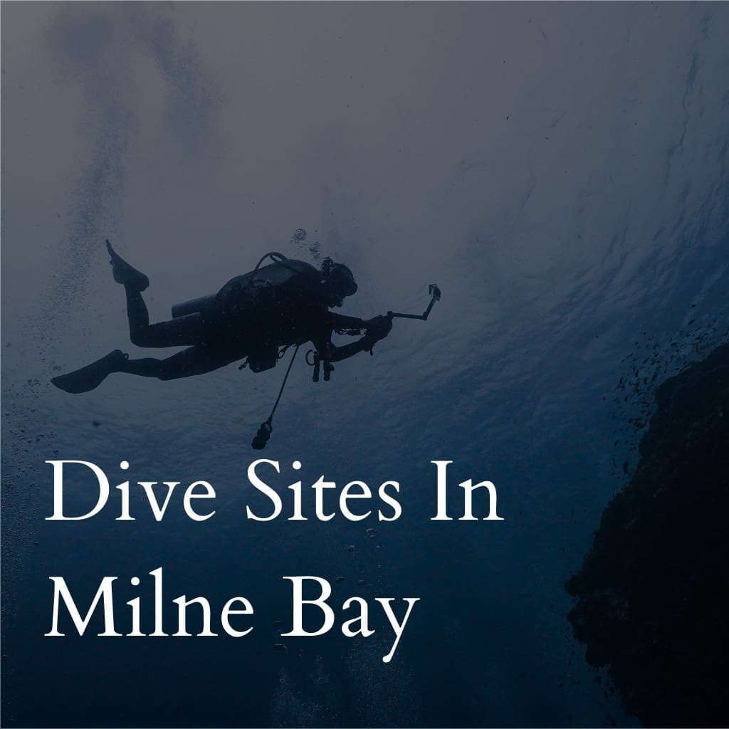 Diver exploring undersea rocks at Milne Bay