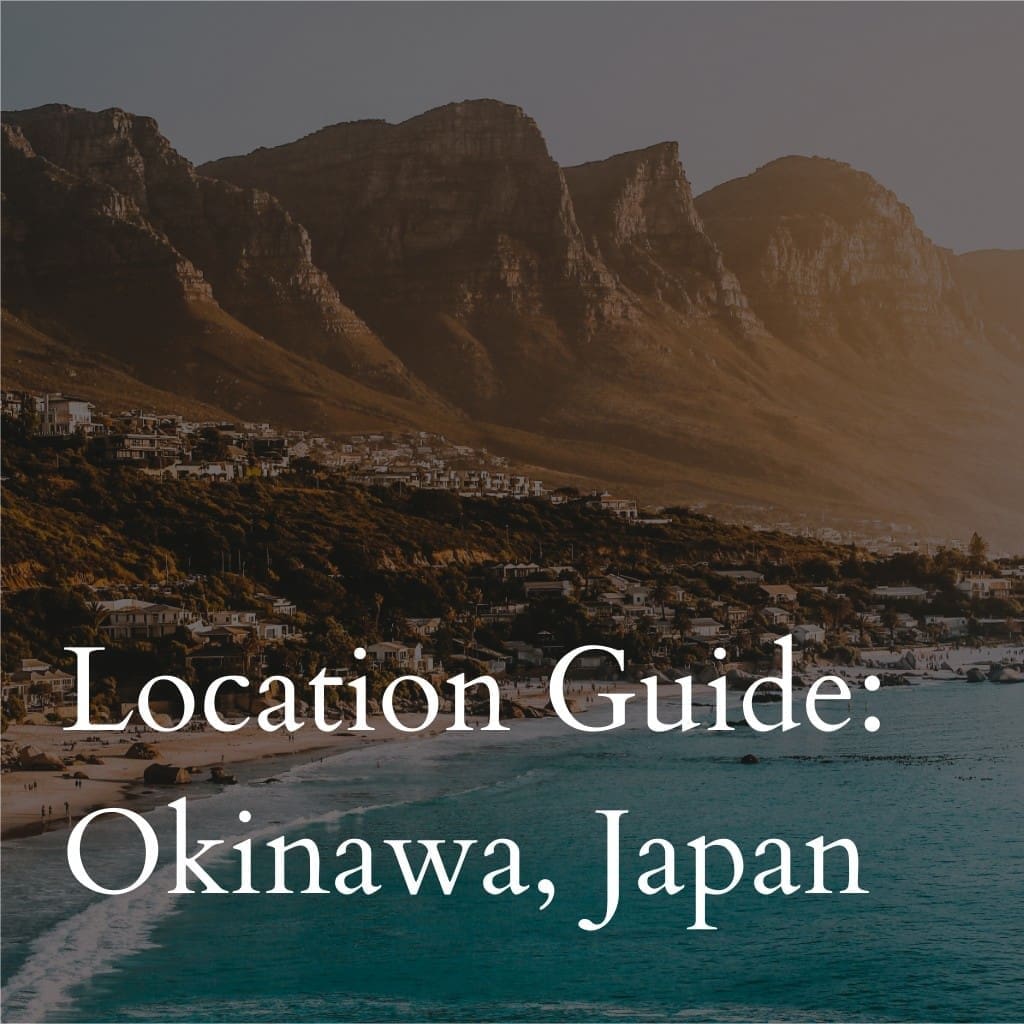 Okinawa Guide text over scenic mountainous coastline